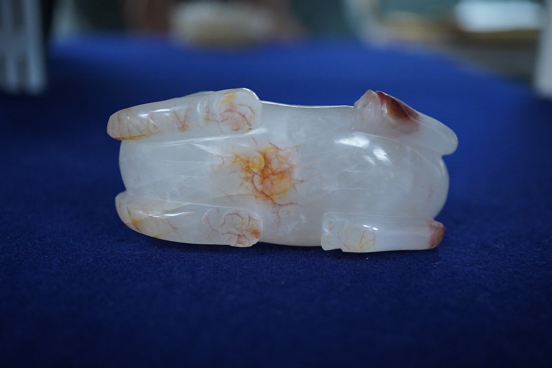 A Chinese agate carving of a horse and monkey, 8cm wide